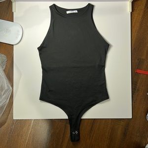 Black sophisticated bodysuit, size small